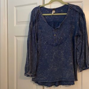 Free People distressed denim colored pullover